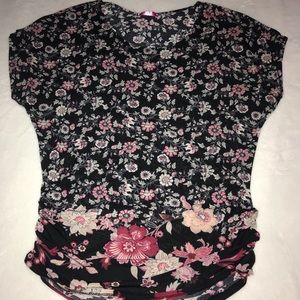 Flowered shirt.